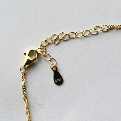 Radiant cross necklace