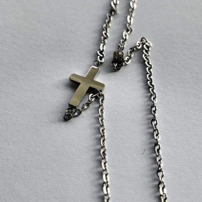 dainty cross necklace in silver tone
